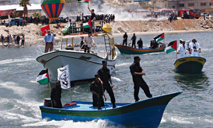 Gaza flotilla: 2 dead, dozens injured in navy boarding