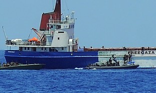 Navy boards, takes control of 'Rachel Corrie' off Gaza coast
