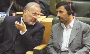 Manouchehr Mottaki with Ahmadinejad