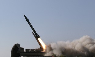 Iranian ballisitic missile launched at war game.