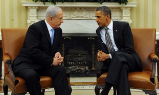 PM Netanyahu sitting with US President Obama