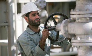 An Iranian oil worker