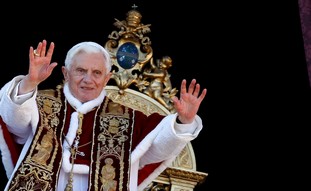 Pope Benedict XVI waves as he gives Urbi et Orbi