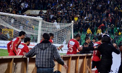 Soccer players flee as chaos erupts in Egypt
