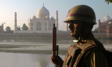 An Indian police officer guarding [illustrative]