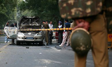 Indian police inspect bombed car in New Delhi 