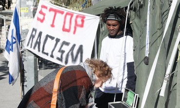 ACTIVIST YAYAUO TAGANI at anti-protest tent