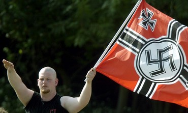 Neo-Nazi man giving Hitler salute