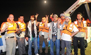 Activists pose on Mavi Marmara 