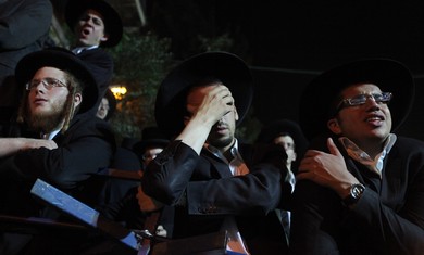 A haredi man overcome with grief
