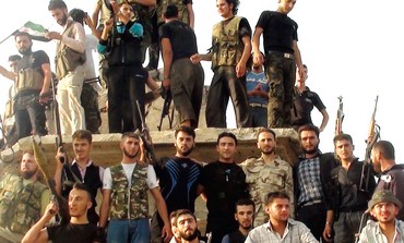Free Syrian Army members in al-Rasten, near Homs
