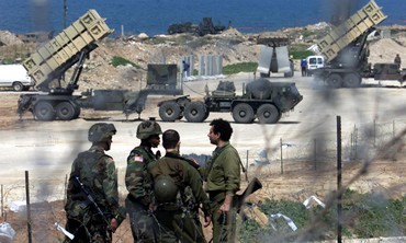 Israeli, US soldiers near Patriot missiles