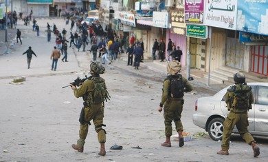 IDF troops disperse Palestinians in Hebron [file]