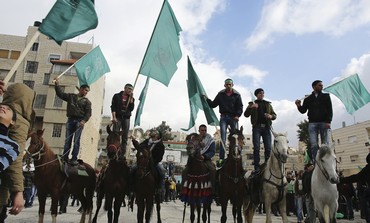 Hamas supporters rally in Hebron 