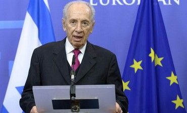 President Shimon Peres talks to EU press conference, March 6, 2013.