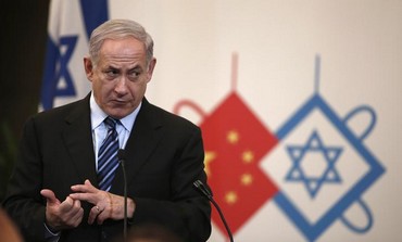 Prime Minister Binyamin Netanyahu gives a speech during a gala dinner in Shanghai , May 6