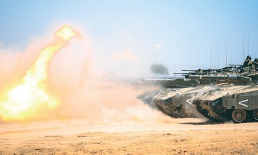 Tanks fire rounds as part of an intensive ‘master gunner’ course.