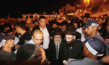 POLICE ESCORT newly elected Sephardi Chief Rabbi Yitzhak Yosef to the Western Wall.
