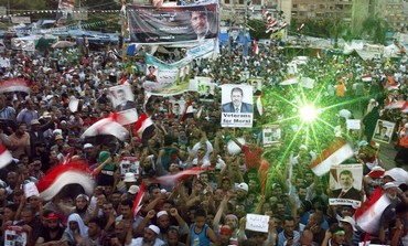 Pro Morsi supporters at Rabaa Adawiya Square in Nasr city, August 11, 2013.