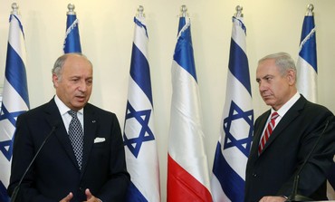 Prime Minister Binyamin Netanyahu with French Foreign Minister Laurent Fabius.