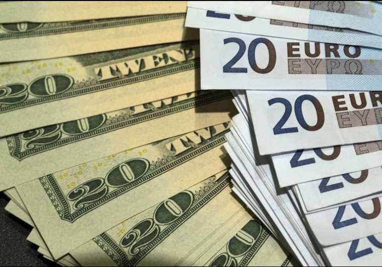 US dollars and euros banknotes are seen in this illustration photo