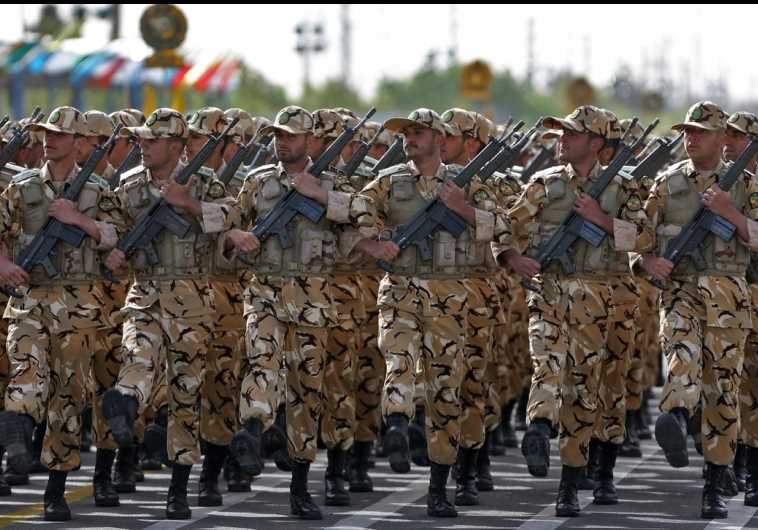 Iranian soldiers take part in a military procession in Tehran