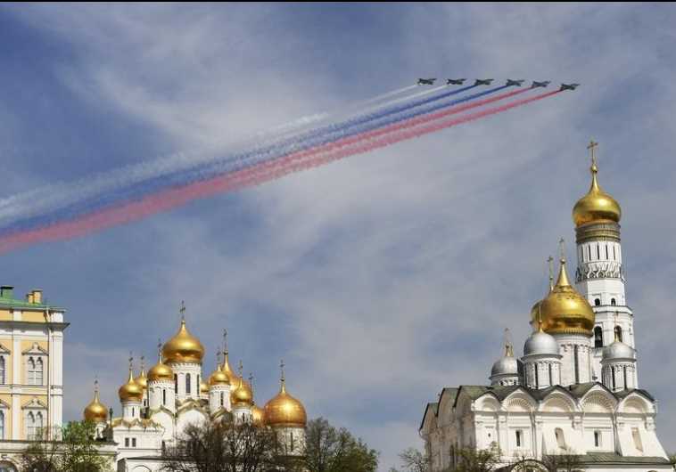 Russian Sukhoi Su-25 Frogfoot ground-attack planes fly in formation over the Red Square 