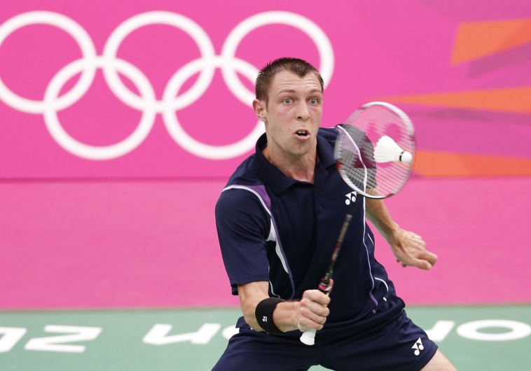 Israel's Misha Zilberman plays against Denmark's Jan O Jorgensen during their match