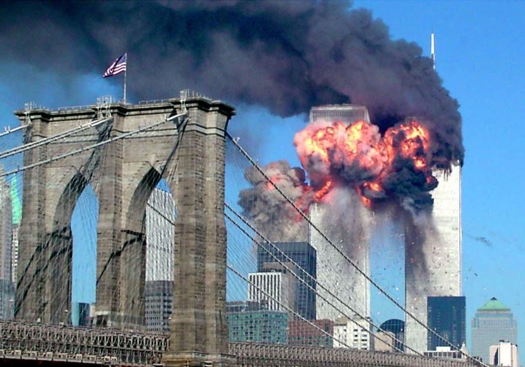 The second tower of the World Trade Center bursts into flames after being hit by a hijacked airplane