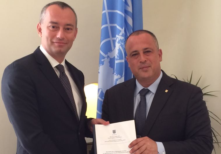 UN Special Coordinator for the Middle East Peace Process Nickolay Mladenov (L) and MK Hilik Bar