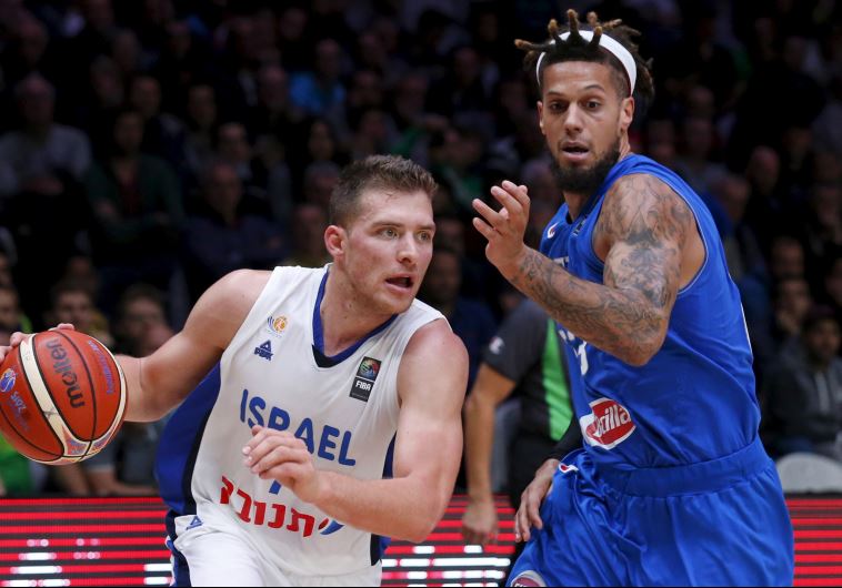 Israel's Gal Mekel goes for the basket against Italy's Daniel Hackett
