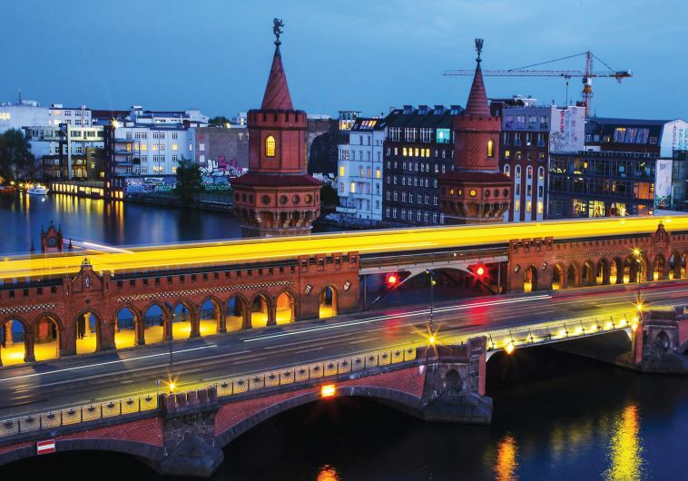 A SCENE from Berlin, with the Oberbaum Bridge in the foreground