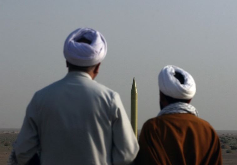 Iranian clerics look at a ballistic missile Shahab 1