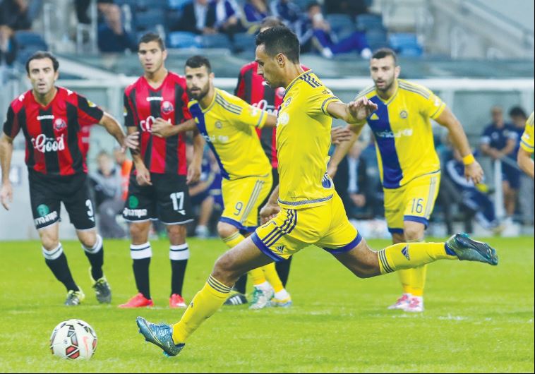 Maccabi Tel Aviv midfielder Eran Zahavi scored his 100th goal in a 3-0 win at Hapoel Haifa