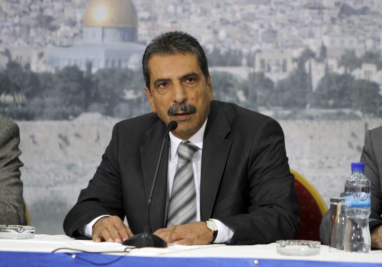 Tawfiq Tirawi speaks during a news conference in the West Bank city of Ramallah