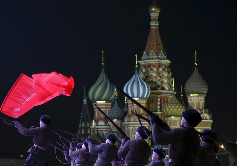 Russian servicemen, dressed in historical uniforms, take part in a military parade rehearsal