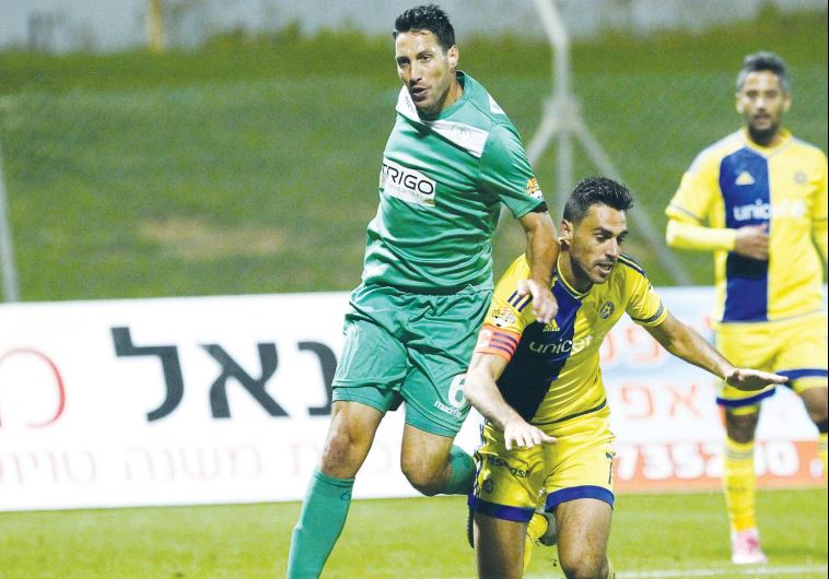 Maccabi Tel Aviv and captain Eran Zahavi (right) stumbled against Hapoel Kfar Saba and Amir Nusbaum