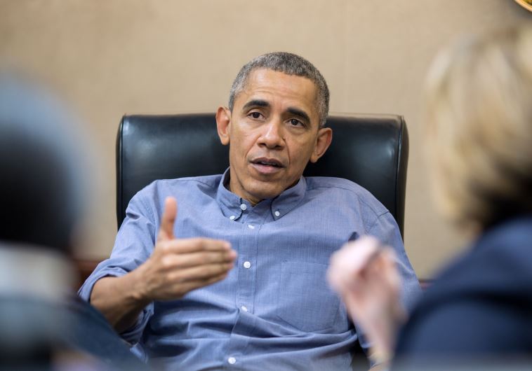 US President Barack Obama meets with staff in the White House Situation Room