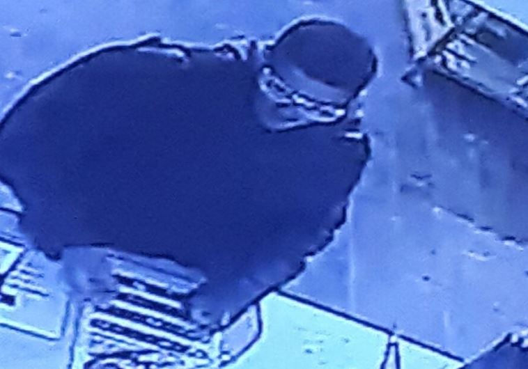 The suspect is seen on closed-circuit television just moments before opening fire in Tel Aviv