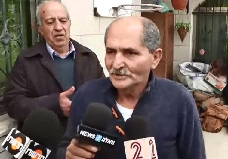 Screenshot of suspect's father at press conference in front of his hosue in northern Israel.