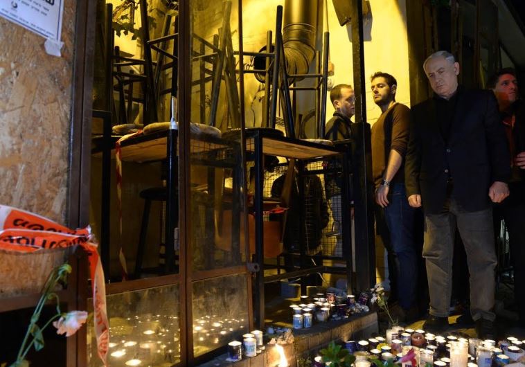 Prime Minister Benjamin Netanyahu at the scene of the shooting attack in Tel Aviv