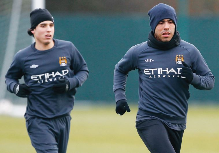 Gai Assulin (left) has trained with some of the world’s best players – including Carlos Tevez (right