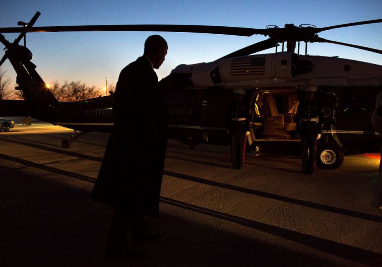 President Barack Obama boards Marine One at the Hope landing zone for departure en route to Chicago