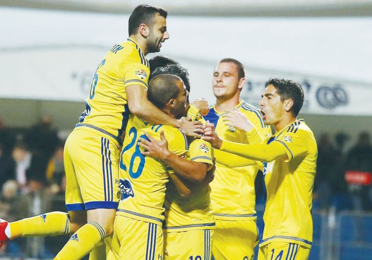 Maccabi Tel Aviv players celebrate after securing their place in the State Cup last-16