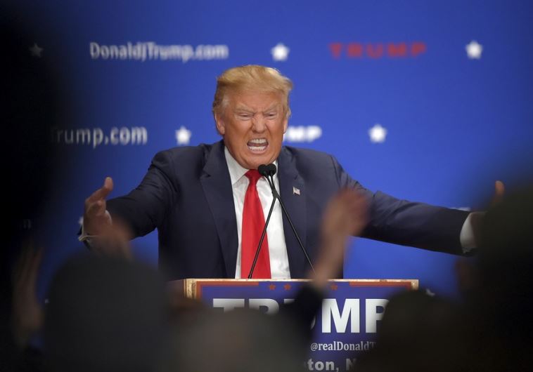 US Republican presidential candidate Donald Trump addresses the crowd at a campaign rally