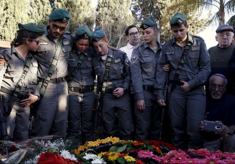 Comrades of Border Policewoman Hadar Cohen mourn during her funeral in Yehud