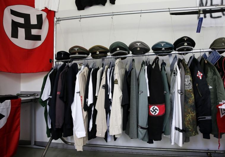Nazi uniforms and a Swastika flag that were confiscated by the Berlin police