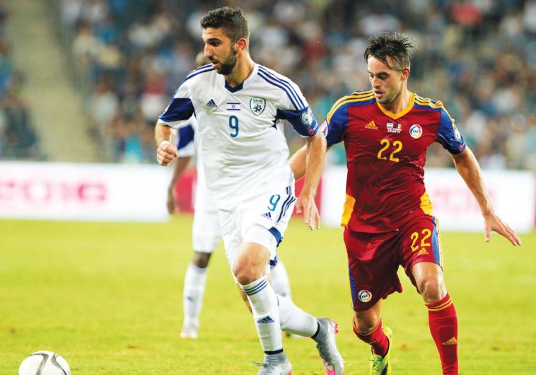 Israel striker Munas Dabbur (left)