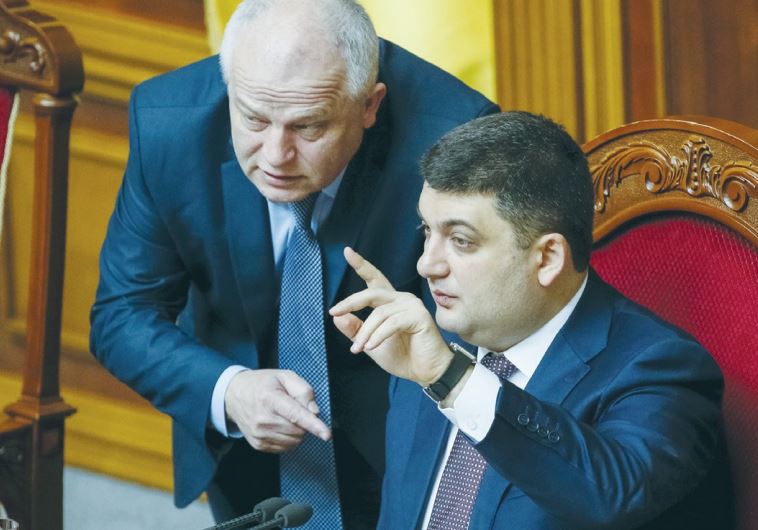 UKRAINIAN PARLIAMENT SPEAKER Volodmyr Groysman (right) speaks with Stepan Kubiv, President Petro Por