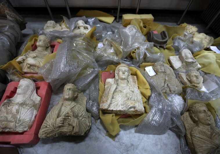 Antiquities are unwrapped as thousands of priceless antiques from across war-ravaged Syria are gathe